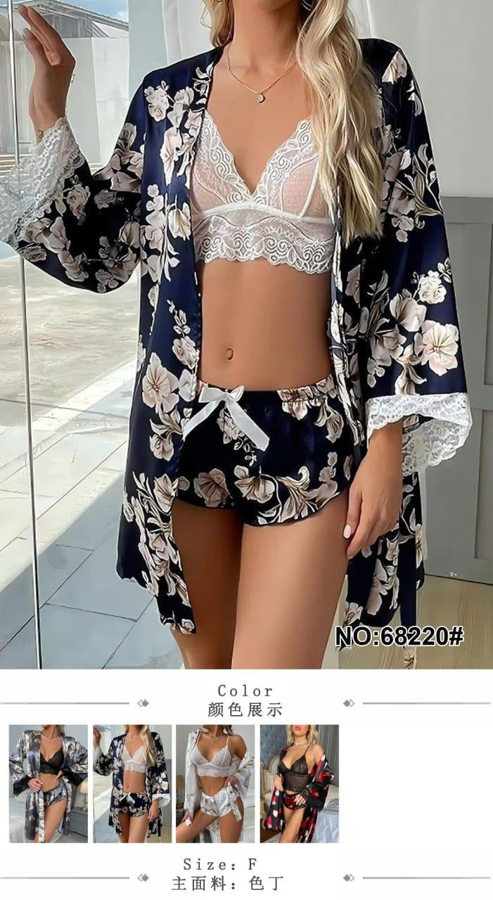 Three-piece luxury lounge and sleepwear set crafted from a botanical silk-satin fabric in a deep navy blue color palette.
